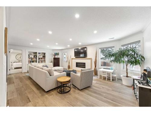 131 Canterbury Court Sw, Calgary, AB - Indoor Photo Showing Living Room With Fireplace