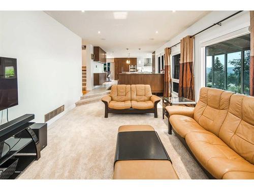 16 Silver Creek Place Nw, Calgary, AB - Indoor Photo Showing Living Room