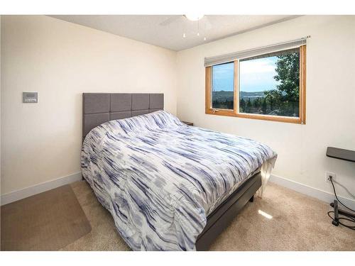 16 Silver Creek Place Nw, Calgary, AB - Indoor Photo Showing Bedroom