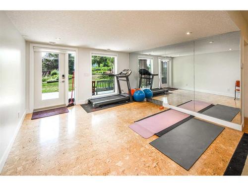 16 Silver Creek Place Nw, Calgary, AB - Indoor Photo Showing Gym Room