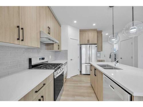 525 Corner Meadows Way Ne, Calgary, AB - Indoor Photo Showing Kitchen With Stainless Steel Kitchen With Double Sink With Upgraded Kitchen