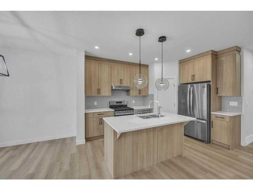 525 Corner Meadows Way Ne, Calgary, AB - Indoor Photo Showing Kitchen With Stainless Steel Kitchen With Double Sink