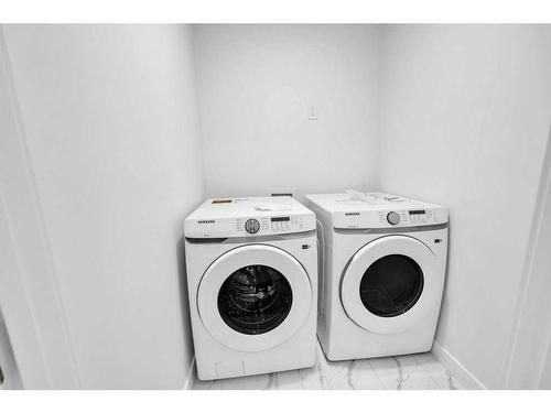 525 Corner Meadows Way Ne, Calgary, AB - Indoor Photo Showing Laundry Room