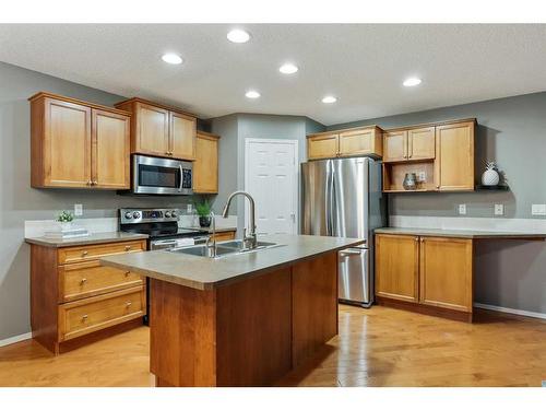 30 Royal Oak Grove Nw, Calgary, AB - Indoor Photo Showing Kitchen With Double Sink