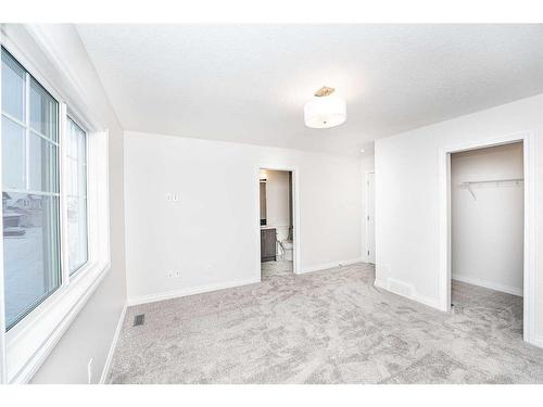 572 Baywater Manor Sw, Airdrie, AB - Indoor Photo Showing Other Room