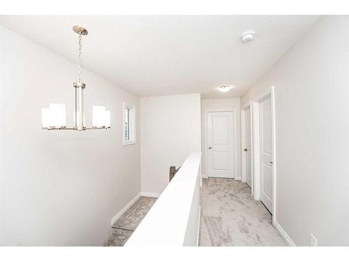 572 Baywater Manor Sw, Airdrie, AB - Indoor Photo Showing Other Room