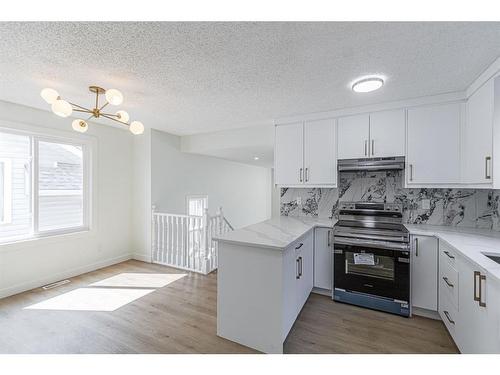 122 Sandstone Drive Nw, Calgary, AB - Indoor Photo Showing Kitchen