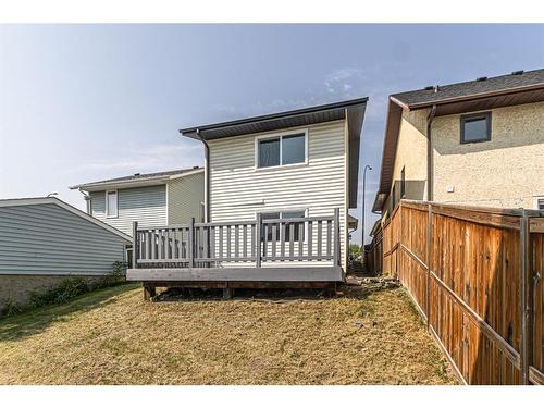 122 Sandstone Drive Nw, Calgary, AB - Outdoor With Deck Patio Veranda With Exterior