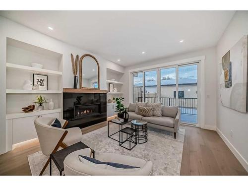 440 23 Avenue Nw, Calgary, AB - Indoor Photo Showing Living Room With Fireplace