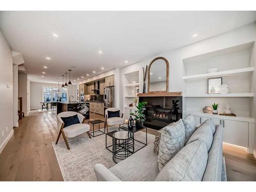 440 23 Avenue Nw, Calgary, AB - Indoor Photo Showing Living Room With Fireplace