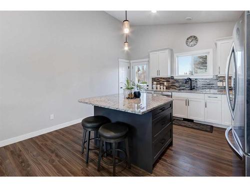 45 Mackenzie Way, Carstairs, AB - Indoor Photo Showing Kitchen With Upgraded Kitchen