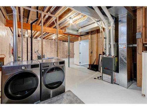 45 Mackenzie Way, Carstairs, AB - Indoor Photo Showing Laundry Room