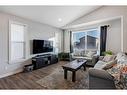 45 Mackenzie Way, Carstairs, AB  - Indoor Photo Showing Living Room 