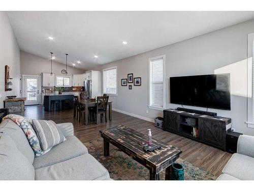 45 Mackenzie Way, Carstairs, AB - Indoor Photo Showing Living Room