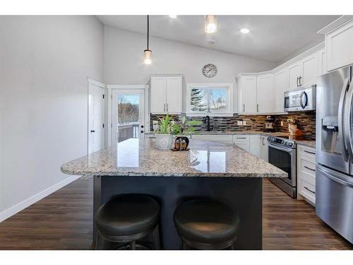 45 Mackenzie Way, Carstairs, AB - Indoor Photo Showing Kitchen With Upgraded Kitchen