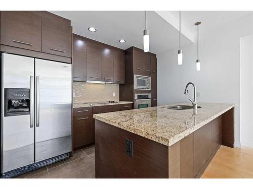 309-540 34 Street Nw, Calgary, AB - Indoor Photo Showing Kitchen With Double Sink With Upgraded Kitchen