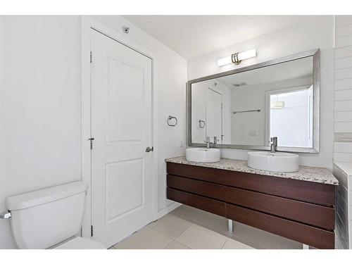 309-540 34 Street Nw, Calgary, AB - Indoor Photo Showing Laundry Room