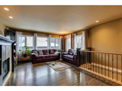 3140 46 Street Sw, Calgary, AB - Indoor Photo Showing Living Room With Fireplace