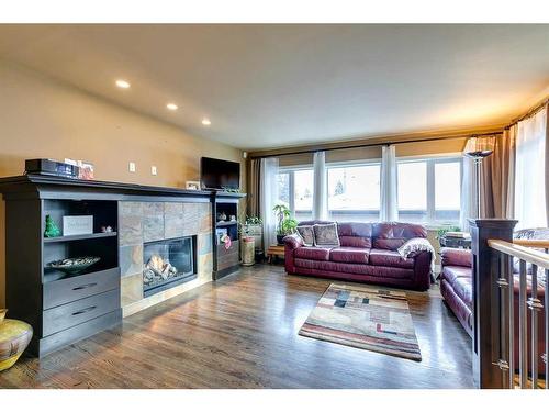 3140 46 Street Sw, Calgary, AB - Indoor Photo Showing Living Room With Fireplace