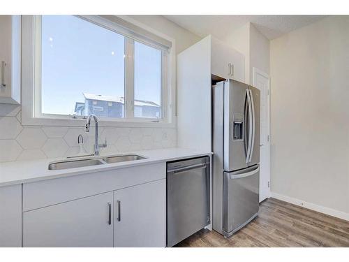 445-301 Redstone Boulevard Ne, Calgary, AB - Indoor Photo Showing Kitchen With Double Sink