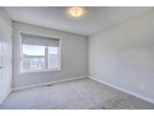 445-301 Redstone Boulevard Ne, Calgary, AB - Indoor Photo Showing Other Room