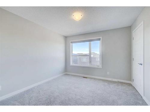 445-301 Redstone Boulevard Ne, Calgary, AB - Indoor Photo Showing Other Room