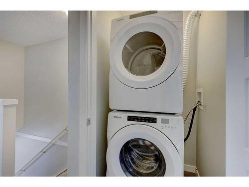 445-301 Redstone Boulevard Ne, Calgary, AB - Indoor Photo Showing Laundry Room