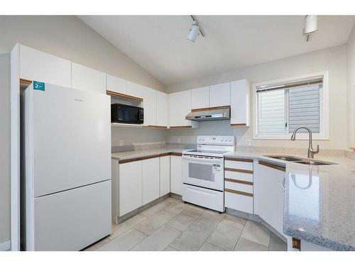 57 Citadel Gardens Nw, Calgary, AB - Indoor Photo Showing Kitchen With Double Sink