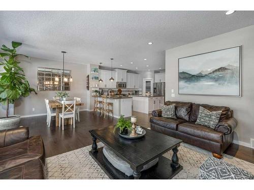 113 Heritage Cove, Cochrane, AB - Indoor Photo Showing Living Room