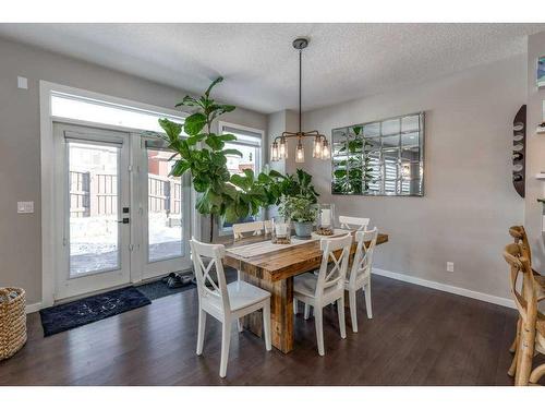 113 Heritage Cove, Cochrane, AB - Indoor Photo Showing Dining Room