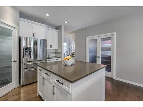 113 Heritage Cove, Cochrane, AB - Indoor Photo Showing Kitchen