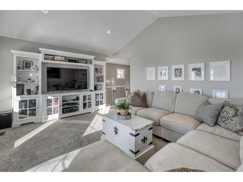 113 Heritage Cove, Cochrane, AB - Indoor Photo Showing Living Room