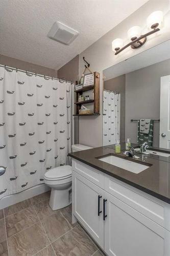 113 Heritage Cove, Cochrane, AB - Indoor Photo Showing Bathroom