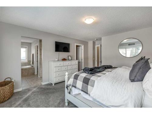 113 Heritage Cove, Cochrane, AB - Indoor Photo Showing Bedroom