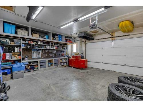 113 Heritage Cove, Cochrane, AB - Indoor Photo Showing Garage