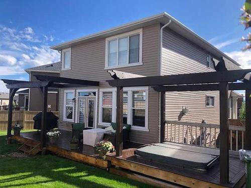 113 Heritage Cove, Cochrane, AB - Outdoor With Deck Patio Veranda