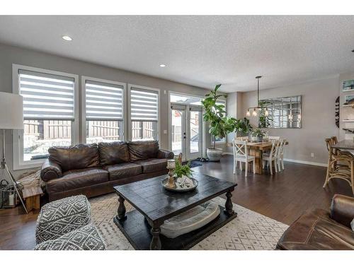 113 Heritage Cove, Cochrane, AB - Indoor Photo Showing Living Room