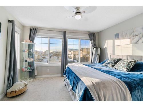 22 Kingfisher Crescent Se, Airdrie, AB - Indoor Photo Showing Bedroom