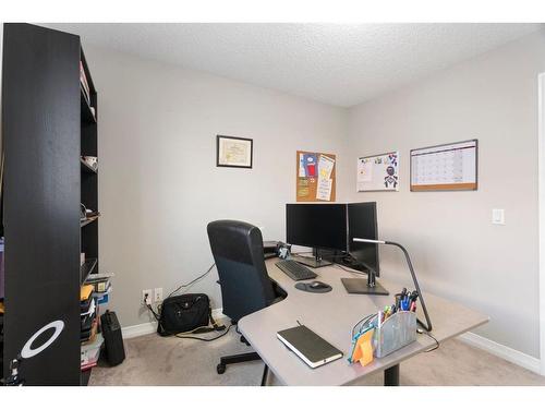 22 Kingfisher Crescent Se, Airdrie, AB - Indoor Photo Showing Office