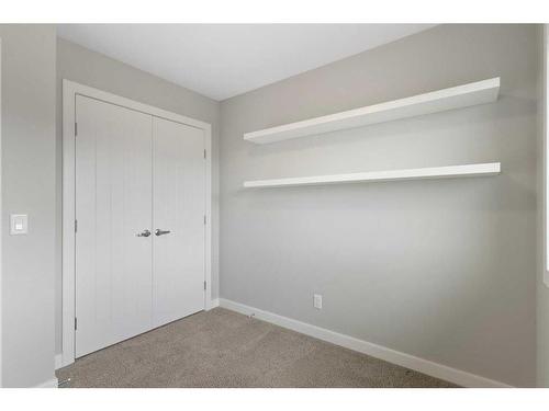 182 Willow Green, Cochrane, AB - Indoor Photo Showing Other Room