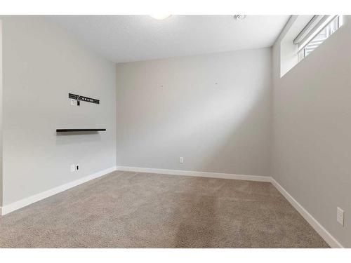 182 Willow Green, Cochrane, AB - Indoor Photo Showing Other Room