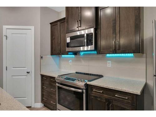 247 Kinniburgh Road, Chestermere, AB - Indoor Photo Showing Kitchen