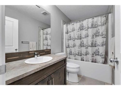 247 Kinniburgh Road, Chestermere, AB - Indoor Photo Showing Bathroom