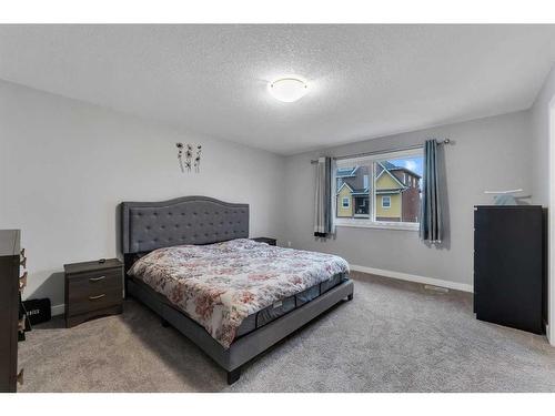 247 Kinniburgh Road, Chestermere, AB - Indoor Photo Showing Bedroom