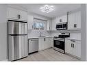 37-131 Templehill Drive Ne, Calgary, AB  - Indoor Photo Showing Kitchen 