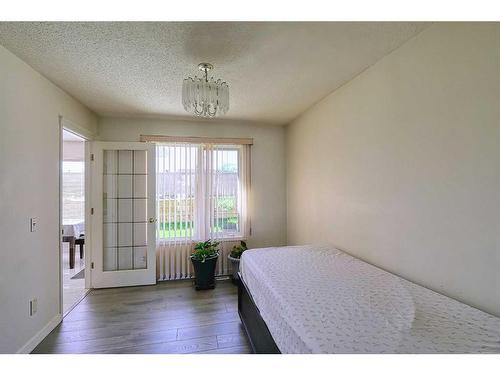 250 Coral Keys Court Ne, Calgary, AB - Indoor Photo Showing Bedroom