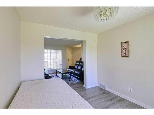 250 Coral Keys Court Ne, Calgary, AB - Indoor Photo Showing Bedroom