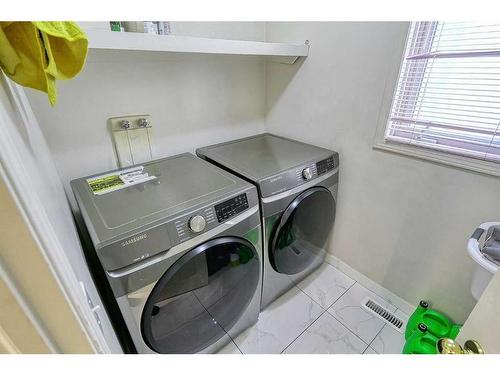 250 Coral Keys Court Ne, Calgary, AB - Indoor Photo Showing Laundry Room