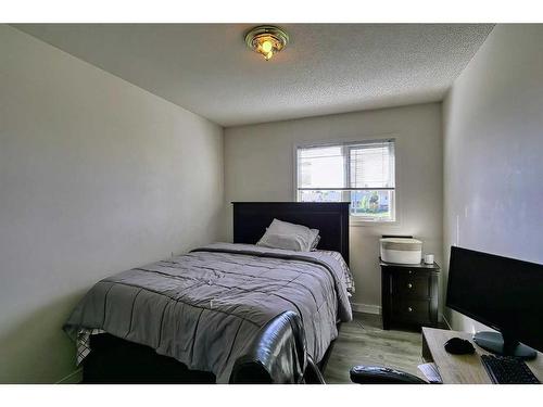 250 Coral Keys Court Ne, Calgary, AB - Indoor Photo Showing Bedroom