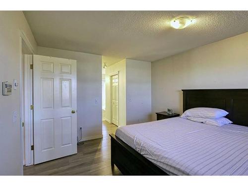 250 Coral Keys Court Ne, Calgary, AB - Indoor Photo Showing Bedroom